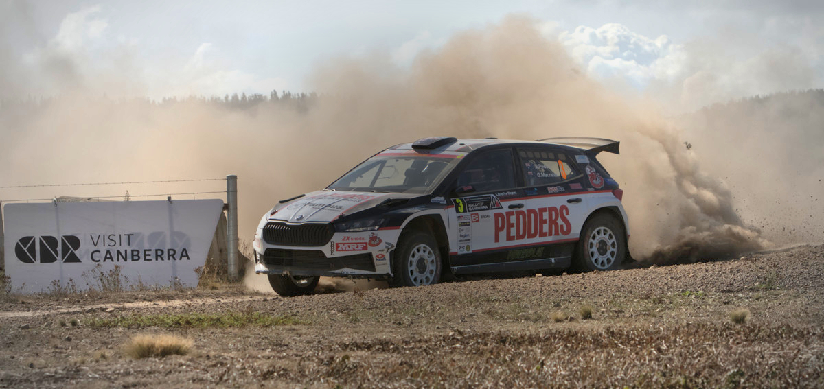 Rally Car (Toyota Yaris) kicking up a huge dust cloud